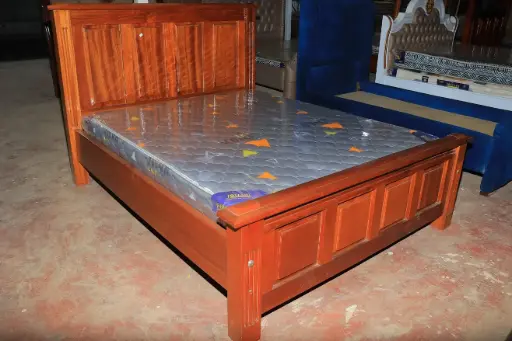 Brown wooden bed